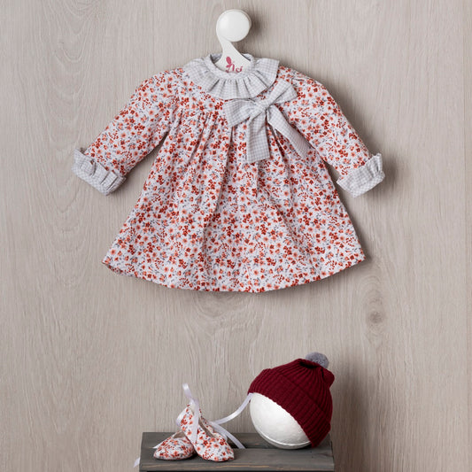 V. Pepa Flores Rojas con Gorro Granate